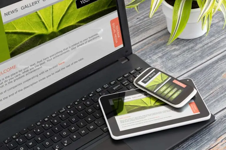 A laptop, smartphone, and tablet displaying the same website layout, emphasizing responsive web design optimized for multiple devices with consistent branding and usability.